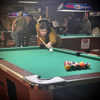 Ivory Billiard Room - a woman playing pool - Pool Halls Near Me - Holyoke, Massachusetts Ivory Billiard Room - a woman playing pool - Pool Halls Near Me - Holyoke, Massachusetts