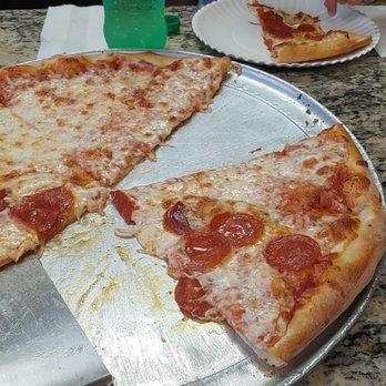 Leo's Pizza - a slice of pepperoni pizza - Pizza Near Me - Miami, Florida Leo's Pizza - a slice of pepperoni pizza - Pizza Near Me - Miami, Florida