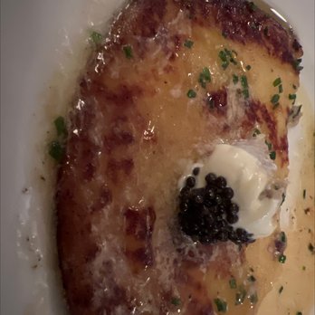 Neptune Oyster - Johnny cake topped with creme fraiche, smoked bluefish & sturgeon caviar - Seafood Near Me - Boston, Massachusetts Neptune Oyster - Johnny cake topped with creme fraiche, smoked bluefish & sturgeon caviar - Seafood Near Me - Boston, Massachusetts