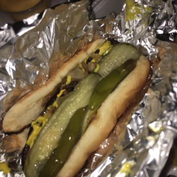 Nadia Fish & Chicken - a hot dog with pickles - Seafood Near Me - Chicago, Illinois