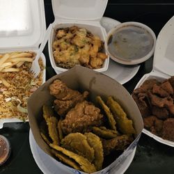 Sol Oriental - Fried rice with french fries and garlic tostones, egg foo young, fried carnitas.