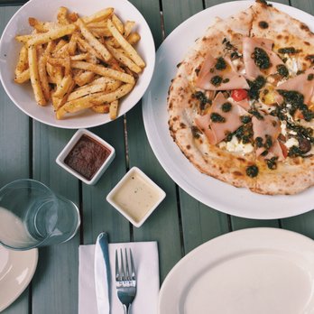 2145 Eats - garlic fries with garlic aioli and house ketchup & pesto pizza with mortadella (ham) - Pizza Near Me - Costa Mesa, California