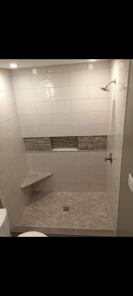 Slide of Bathmatic Custom Tile and Shower