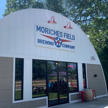 Moriches Field Brewing - Outside. You can tell it was a hanger. - Brewpubs Near Me - Center Moriches, New York Moriches Field Brewing - Outside. You can tell it was a hanger. - Brewpubs Near Me - Center Moriches, New York
