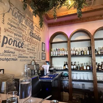 Marinas Bistro & Rum Bar - Behind the bar - Puerto Rican Near Me - Chicago, Illinois Marinas Bistro & Rum Bar - Behind the bar - Puerto Rican Near Me - Chicago, Illinois