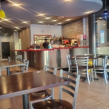 Chirrion Mexican Grill - tables and chairs in a restaurant - Mexican Near Me - Forest Park, Illinois
