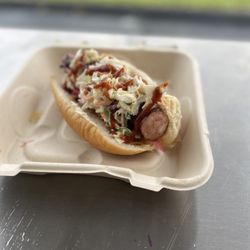 Pink Piggy BBQ - Smoked Kielbasa, Pickled Red Onion, Creamy Slaw and Reaper Sauce