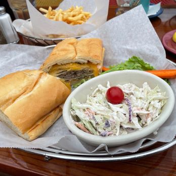 Nepenthe - Burger Med-Well came out well with cole slaw - New American Near Me - Big Sur, California Nepenthe - Burger Med-Well came out well with cole slaw - New American Near Me - Big Sur, California