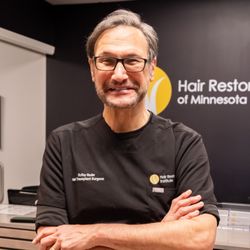 Hair Restoration Institute - Dr Roy Stoller, double board certified facial plastic surgeon greets clients looking to restore bald or thinning hair.