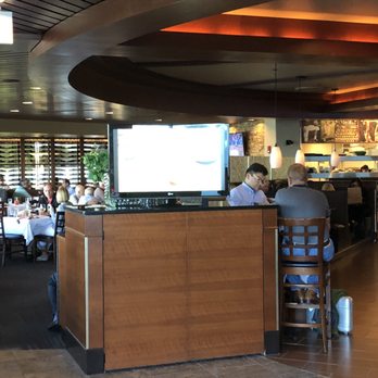 Ditka's Oakbrook - Entrance. Bar to the right and dining room to the left. - American Near Me - Oakbrook Terrace, Illinois Ditka's Oakbrook - Entrance. Bar to the right and dining room to the left. - American Near Me - Oakbrook Terrace, Illinois