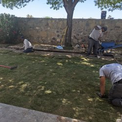 Gonzales Landscape and Irrigation - Laying in the grass.