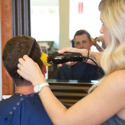Ryan John Salon - Senior Stylist Tiffany Recupero takes care of Ryan John himself.