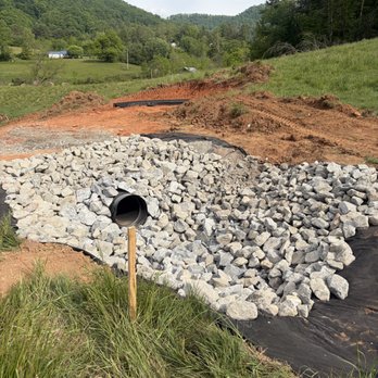 Sucree Construction - Culvert pipe added and rock for directing water from erosion - Septic Services Near Me - Barnardsville, North Carolina Sucree Construction - Culvert pipe added and rock for directing water from erosion - Septic Services Near Me - Barnardsville, North Carolina
