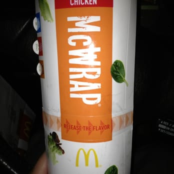 McDonald's - a hand holding a can of chicken - Burgers Near Me - Oceanside, California