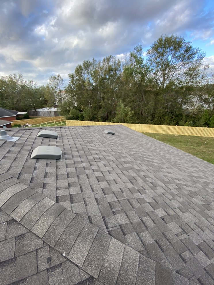 Slide of Migos Roofing