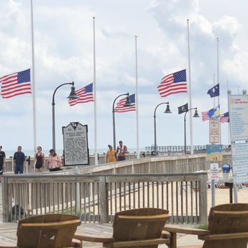 Ocean Front Bar and Grill - american flags flying in the background - American Near Me - Myrtle Beach, South Carolina Ocean Front Bar and Grill - american flags flying in the background - American Near Me - Myrtle Beach, South Carolina