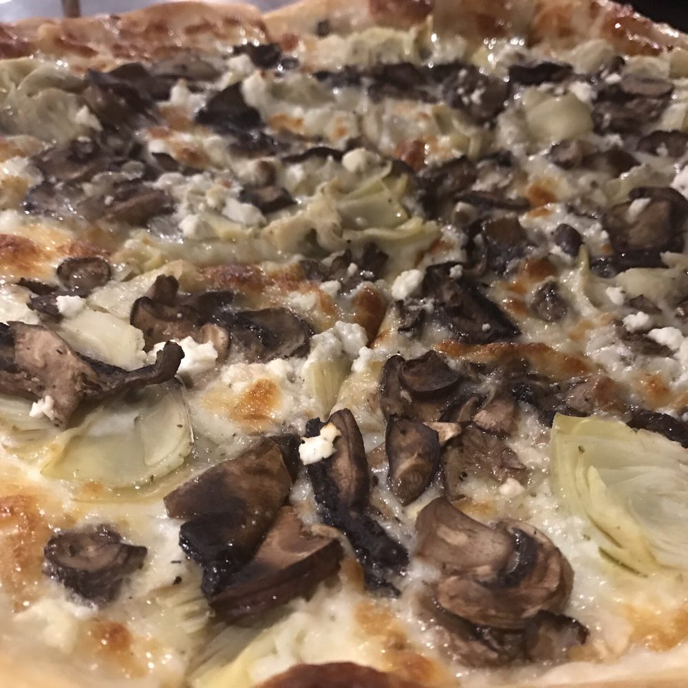 Mezza Luna Pizzeria - The classic Hardy Fungus Pizza YUM - Pizza Near Me - Eugene, Oregon Mezza Luna Pizzeria - The classic Hardy Fungus Pizza YUM - Pizza Near Me - Eugene, Oregon