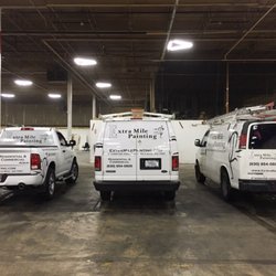 Extra Mile Painting - Extra Mile vehicles. Doing commercial work.