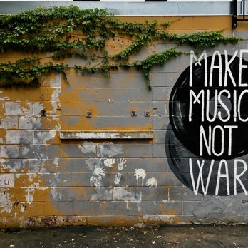 Green Pea Salon - make music not war mural outside the shop - Hair Salons Near Me - Nashville, Tennessee Green Pea Salon - make music not war mural outside the shop - Hair Salons Near Me - Nashville, Tennessee