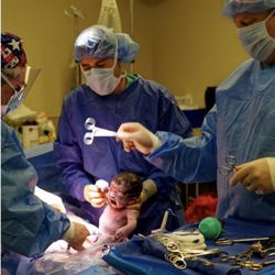 David Ghausi, DO - Dr. Ghausi was kind enough to let me have a professional photographer take pictures of my sons c section. Here are some action shots.