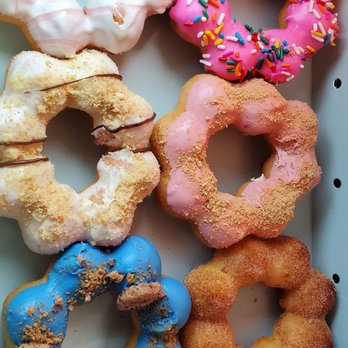 Mochi Dough - I think it was chocolate cheesecake on the top left, animal crackers, vanilla cookie, strawberry shortcake, cookie monster, and churro - Donuts Near Me - Redding, California