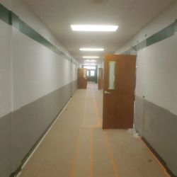 Fresh Coat Painters of Schertz - We recently completed repainting these hallways and restraining the classroom doors at an elementary school in Marion, TX
