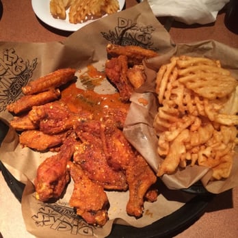 Dick's Wings & Grill - Youngerman Cir - Spicy garlic wings. Done to perfection. - Chicken Wings Near Me - Jacksonville, Florida Dick's Wings & Grill - Youngerman Cir - Spicy garlic wings. Done to perfection. - Chicken Wings Near Me - Jacksonville, Florida