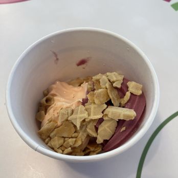 sweetFrog Premium Frozen Yogurt - Peach and cherry with crushed waffle cone topping. - Ice Cream & Frozen Yogurt Near Me - Cary, North Carolina