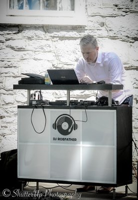 Wedding & Reception - DJ Robfather DJ's and MC'd a wedding for over 8 hours. The wedding was on a beautiful property and was followed by a field party with all kinds of music. As the sun set and the drinks were flowing, the music was cranked up, the party lights kicked on, and the "real" party started! Lots of requests, lots of cheers, and lots of fun!