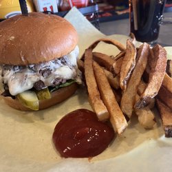 575 Sports & Co - Mushroom Swiss Burger with Green Chili Aioli and all the fixins served with fresh cut fries.