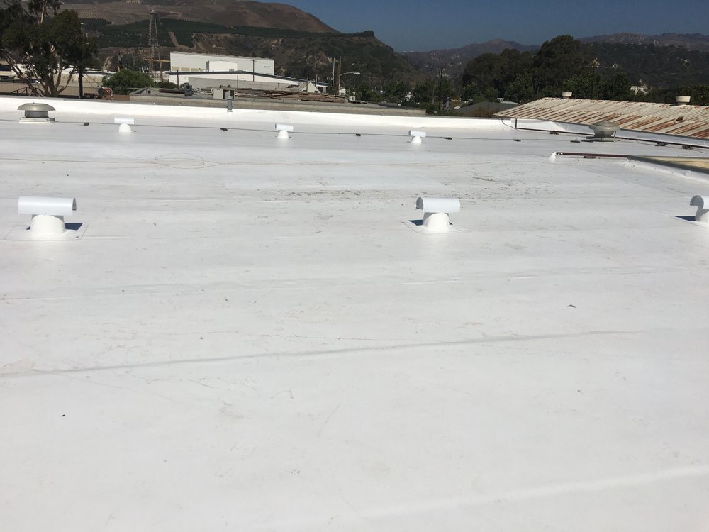 Slide of Espino Roofing