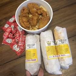 Pardon My Cheesesteak - $75 order. That sandwich not even as big as my hand.