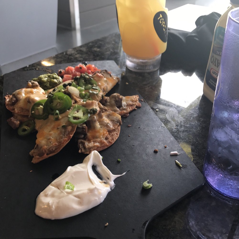 Topgolf - Nachos and pineapple punch - Golf Near Me - Charlotte, North Carolina Topgolf - Nachos and pineapple punch - Golf Near Me - Charlotte, North Carolina