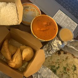 Tandoor Indian Grill - Veggie Samosa, Butter chicken ,garlic naan and mango ice cream.