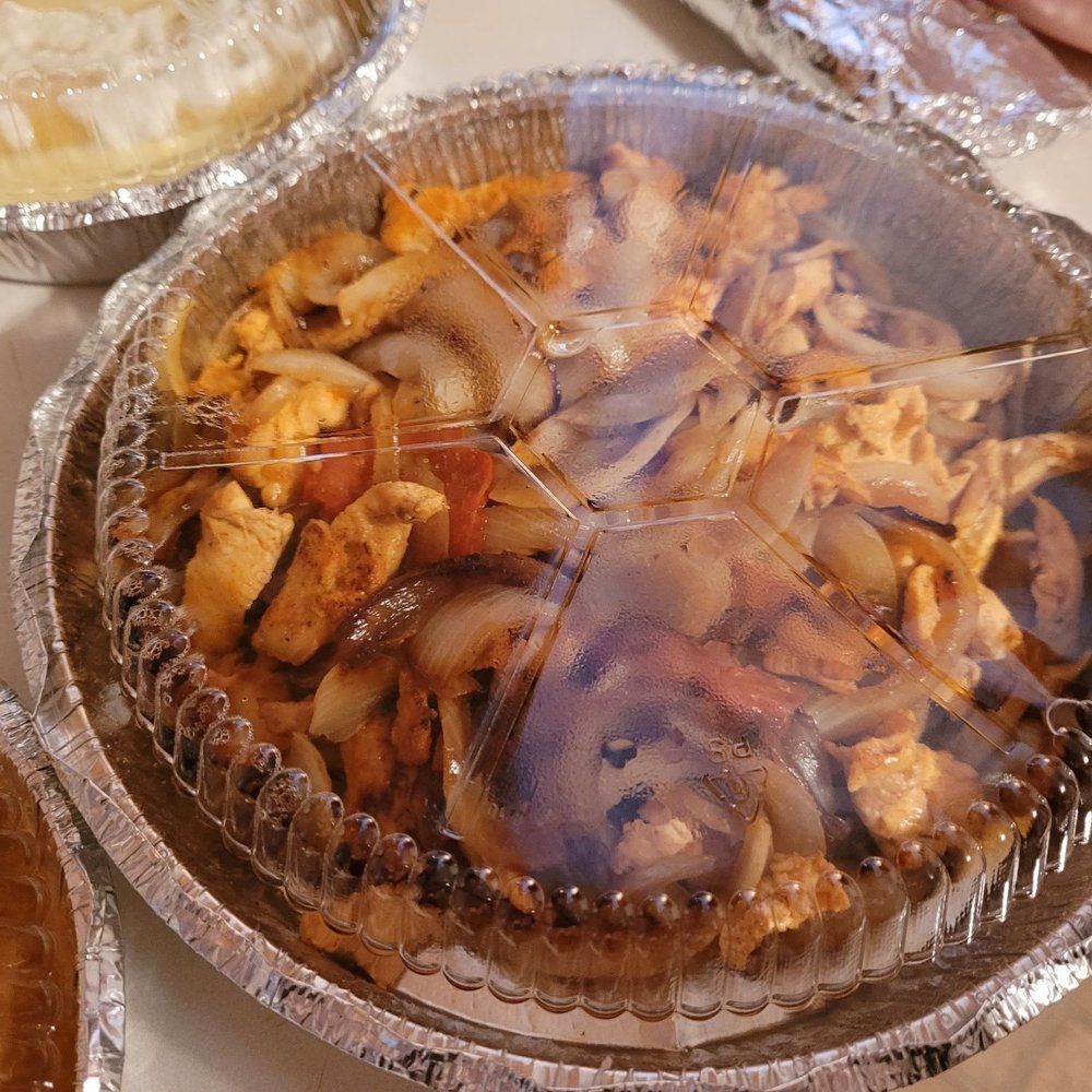 Huge portion of chicken fajitas via DoorDash with no peppers by special order (which was fulfilled.) Huge portion of chicken fajitas via DoorDash with no peppers by special order (which was fulfilled.)