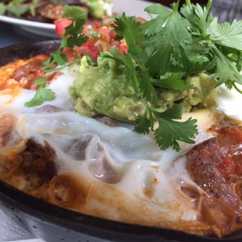 Little Collins - Chipotle braised beef, beans, baked eggs, smashed avocado, jalapeño salsa, crème fraîche, tortilla - Breakfast & Brunch Near Me - Amsterdam, New Hampshire