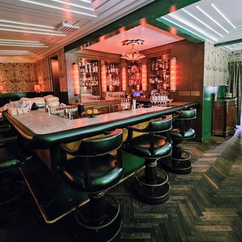 Amour Weho - Indoor bar: massive, heavy, leather upholstered bar stools - French Near Me - West Hollywood, California