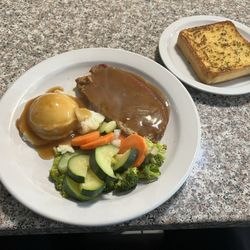 Lugo's Grill - Senior lunch meatloaf with mashed potatoes, veggies, and garlic toast.