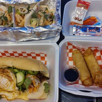 Banh Mi Pho Wings - Grilled Pork Banh Mi With Fried Egg, Pork Eggrolls, and Crispy Chicken Banh Mi Tacos, Pina Colada - Vietnamese Near Me - Austin, Texas