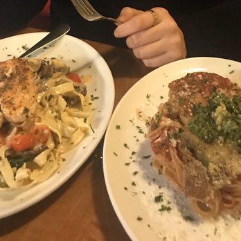 Osteria Rago - Tuscan Salmon (on the left) Chicken parm (on the right) - Italian Near Me - Bloomington, Indiana Osteria Rago - Tuscan Salmon (on the left) Chicken parm (on the right) - Italian Near Me - Bloomington, Indiana