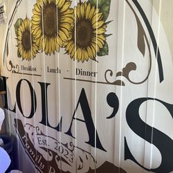 Lola's Family Restaurant - Sign inside of Lola's Family Restaurant.