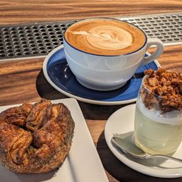 Latte, pandan coconut tapioca pudding, and black sesame kouign amann Latte, pandan coconut tapioca pudding, and black sesame kouign amann