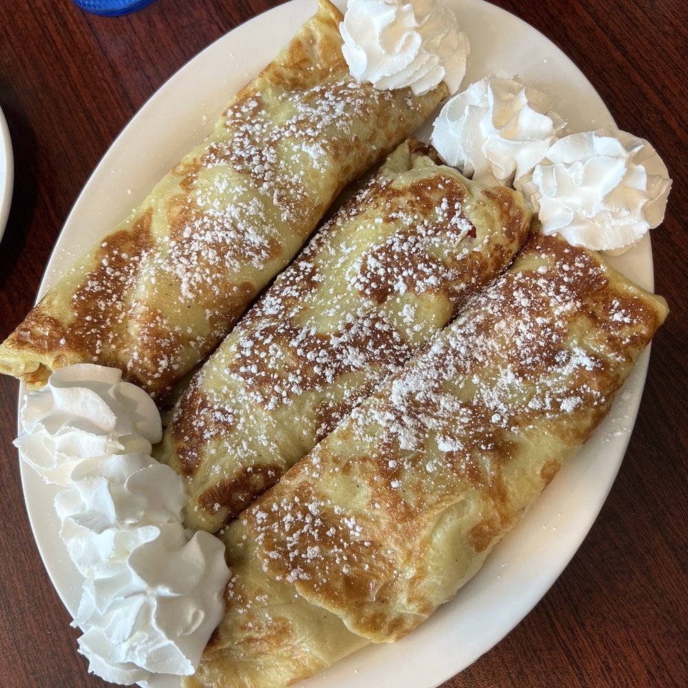 Stacks Pancake house - Strawberry banana crepes without cream cheese sauce. - Pancakes Near Me - Bettendorf, Iowa Stacks Pancake house - Strawberry banana crepes without cream cheese sauce. - Pancakes Near Me - Bettendorf, Iowa
