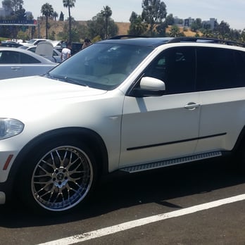 MV WRAPS - BMW X5 wrapped in Satin Pearl White. (after 1 year and 5 months, wrap still looks good) - Auto Detailing Near Me - South El Monte, California