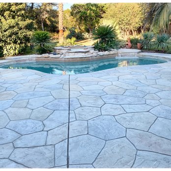 Capital Concrete Coatings - a pool in a backyard - Masonry/Concrete Near Me - Austin, Texas