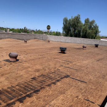 AEL Roofing Services - After Removal of old cap sheet on commercial Roof, Removal is necessary for proper substrate for new Underlayment and cap sheets - Roofing Near Me