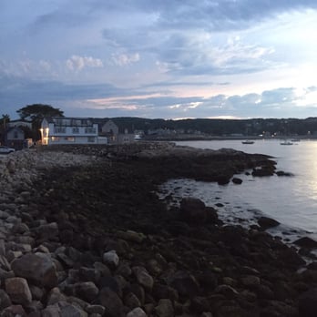 Bearskin Neck Motor Lodge - Sunset from deck at the lodge - Hotels Near Me - Rockport, Massachusetts Bearskin Neck Motor Lodge - Sunset from deck at the lodge - Hotels Near Me - Rockport, Massachusetts