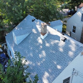 Dupage Roofing - Tear off and re-shingle with some new chimney flashing. - Roofing Near Me
