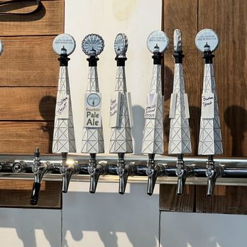 Cape Charles Brewing Company - a row of beer taps - Breweries Near Me - Cape Charles, Virginia Cape Charles Brewing Company - a row of beer taps - Breweries Near Me - Cape Charles, Virginia