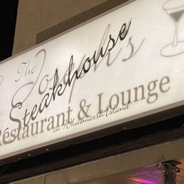 a restaurant and lounge sign a restaurant and lounge sign